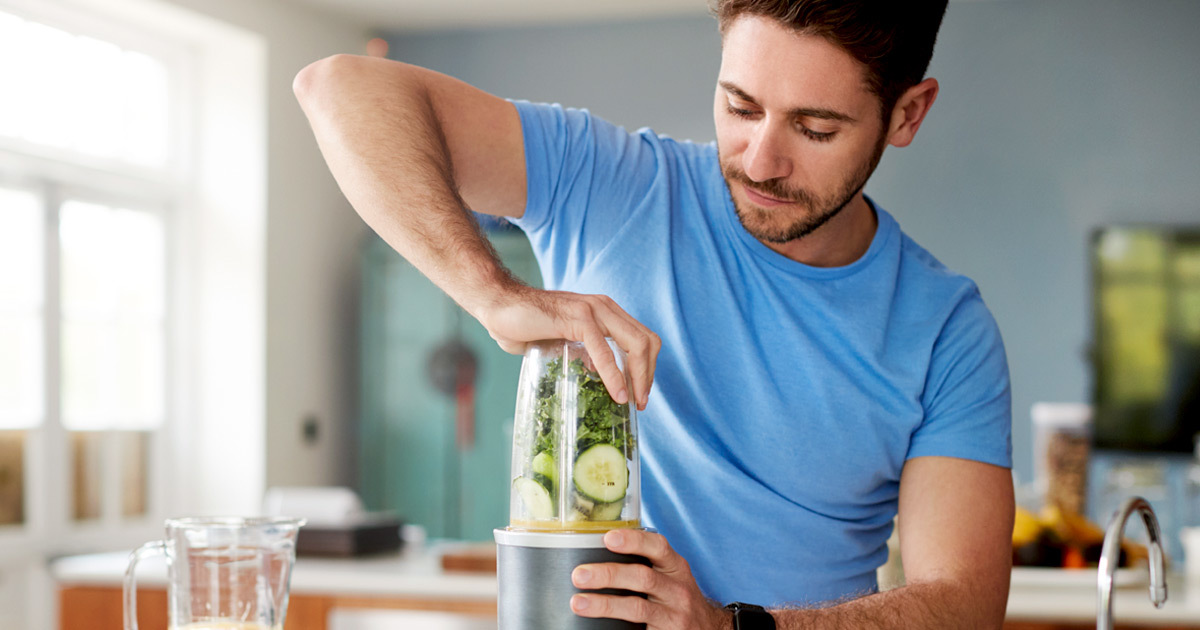 Man making smoothie